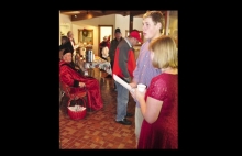 Elsa Knight and Douglas Johnson welcome guests to the 2013 Clay County Museum’s historical Christmas event with music